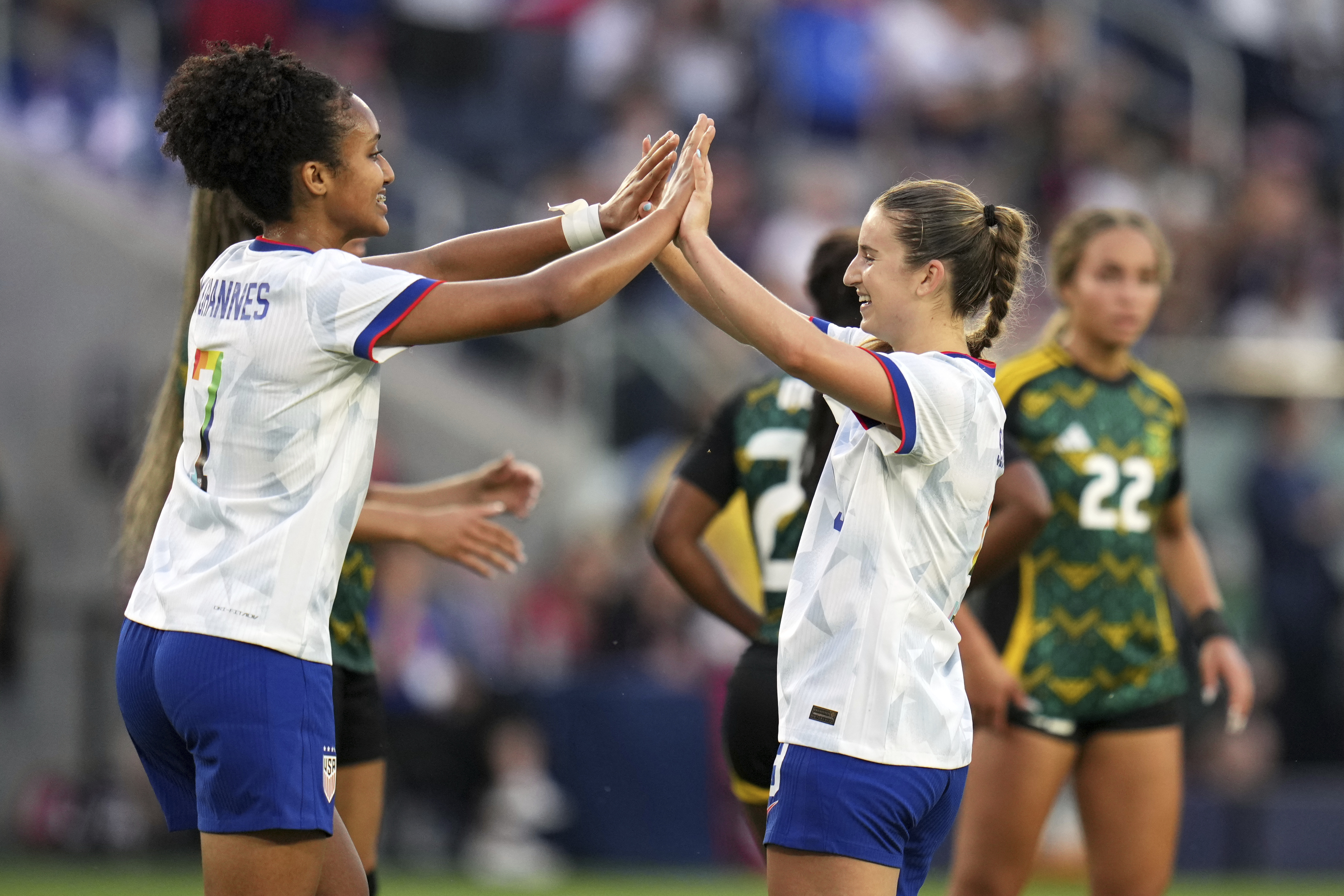 United States' Ally Sentnor, right, is congratulated by teammate Lily Yohannes after scoring during the first half of an international friendly soccer match against Jamaica Tuesday, June 3, 2025, in St. Louis. 