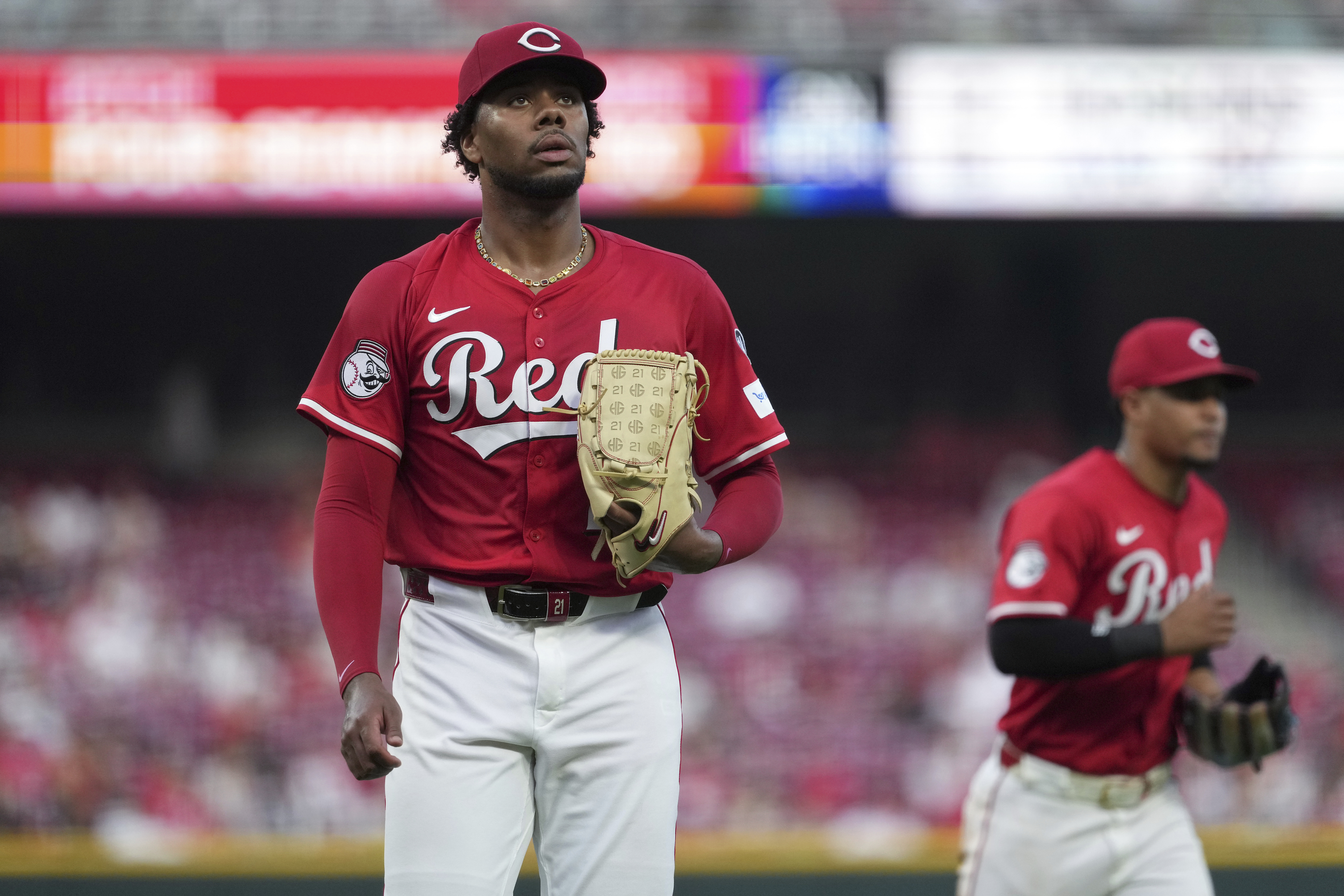 Cincinnati Reds' Hunter Greene walks to the dugout in the fifth inning of a baseball game against the Milwaukee Brewers, Tuesday, June 3, 2025, in Cincinnati. 