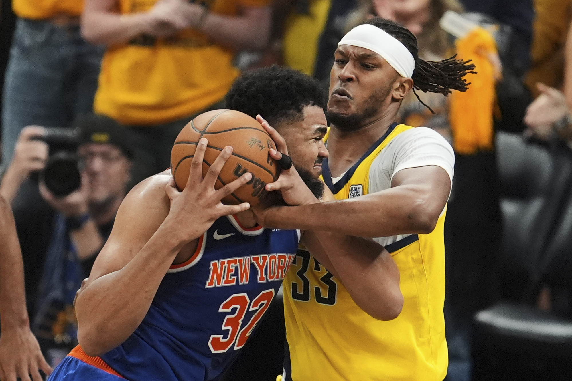 Indiana Pacers center Myles Turner (33) defends against New York Knicks center Karl-Anthony Towns (32) during the second half of Game 6 of the Eastern Conference finals of the NBA basketball playoffs in Indianapolis, Saturday, May 31, 2025. 