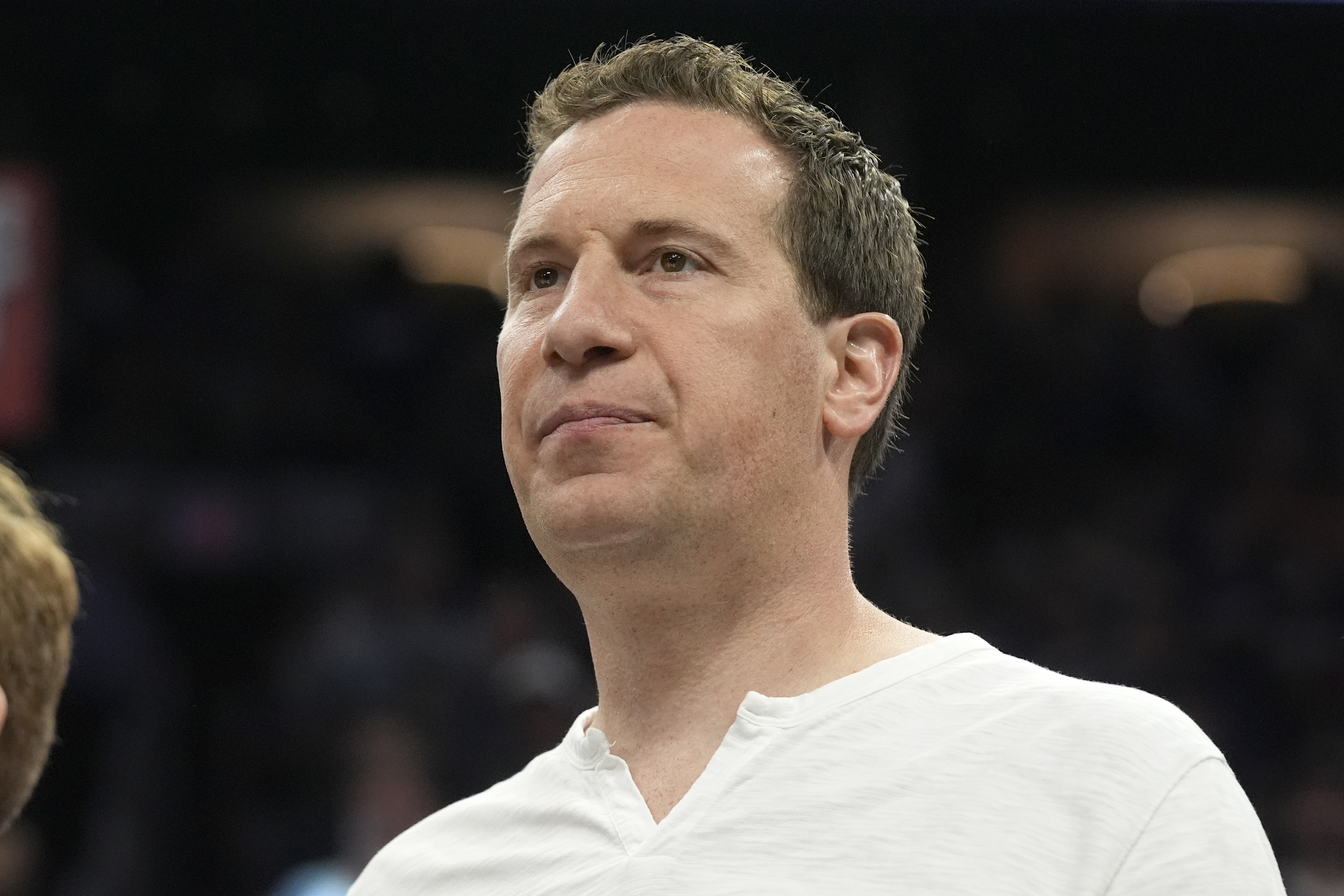 FILE - Phoenix Suns owner Mat Ishbia watches players warm up prior to Game 4 of an NBA basketball first-round playoff series against the Minnesota Timberwolves, April 28, 2024, in Phoenix. 