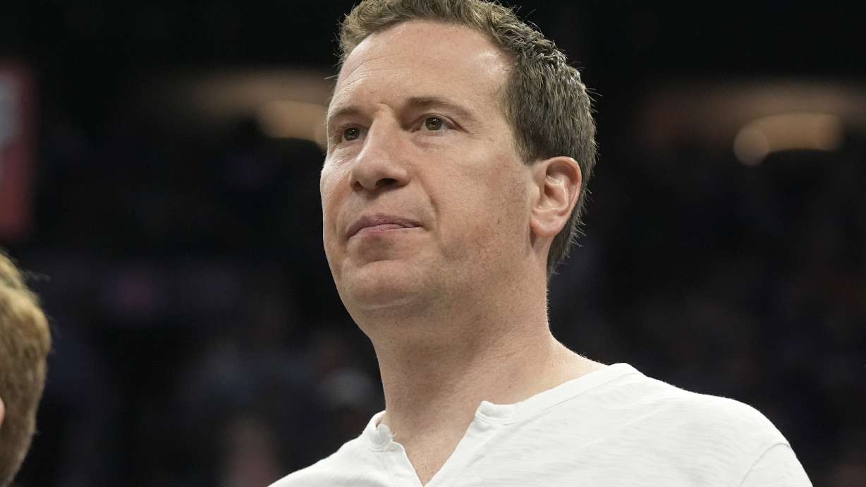 FILE - Phoenix Suns owner Mat Ishbia watches players warm up prior to Game 4 of an NBA basketball first-round playoff series against the Minnesota Timberwolves, April 28, 2024, in Phoenix.