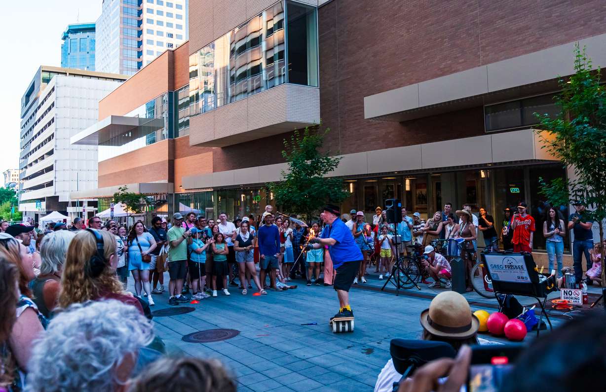 Entertainer Greg Frisbee performs a juggling act during Busker Fest in Salt Lake City on May 30. Stilt walkers, jugglers, balloon artists and magicians are among the activities that will be featured within the "Family Commons" section of Open Streets every Friday and Saturday this June.