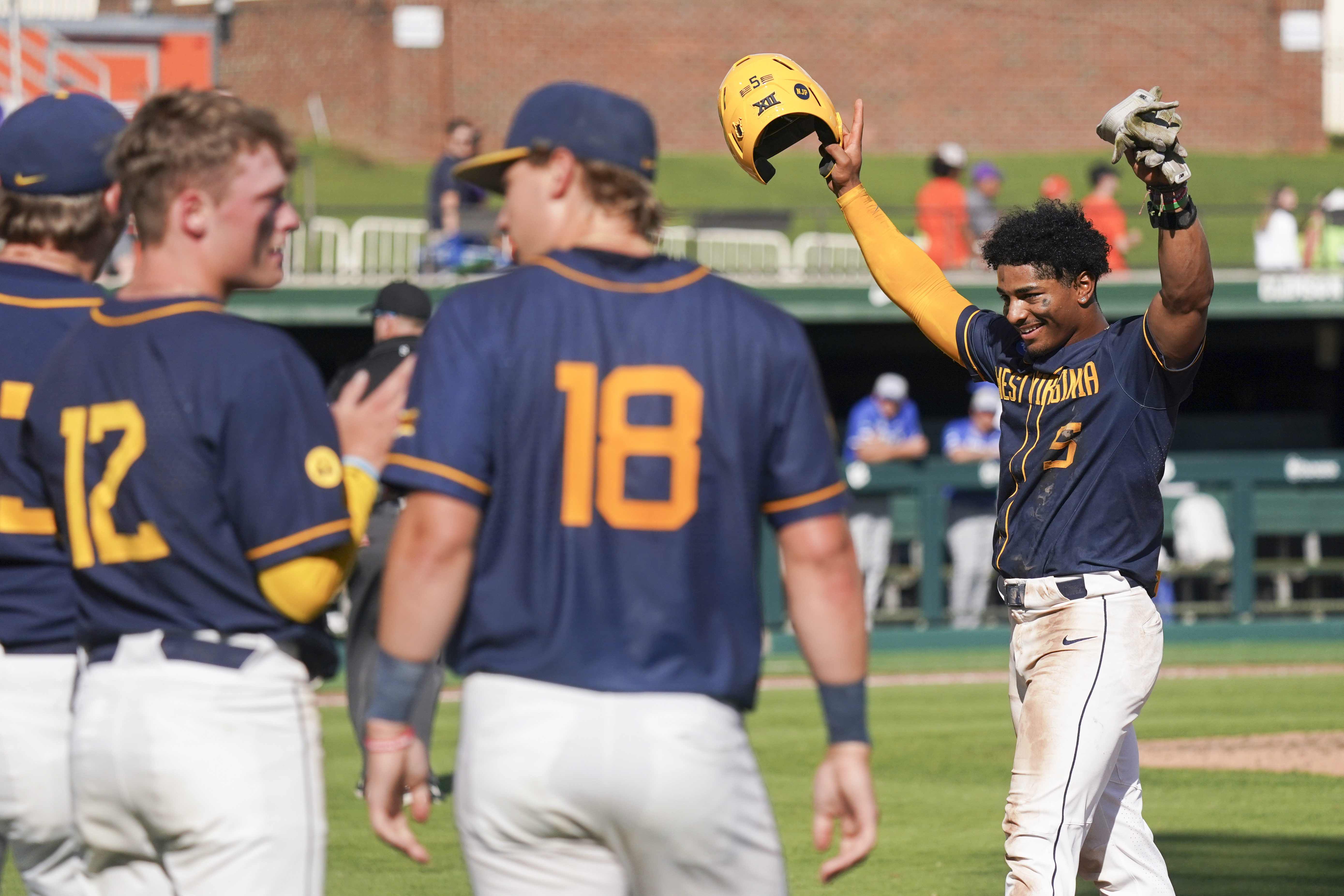 Utility player Armani Guzman leads West Virginia into 2nd straight NCAA super regional