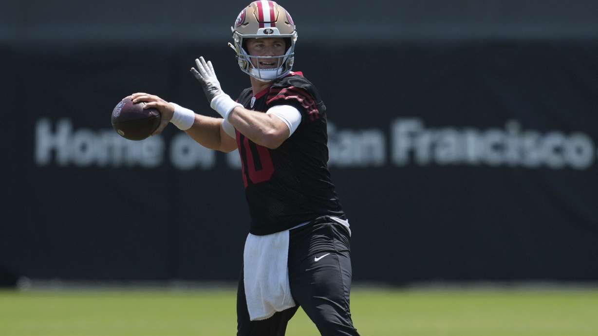 San Francisco 49ers quarterback Mac Jones passes during NFL football practice Wednesday, June 4, 2025, in Santa Clara, Calif.