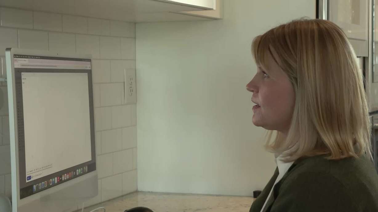 Rachel Lewis Jepperson, who wants to run for her city council, working at her desktop at her house in South Jordan on Wednesday.