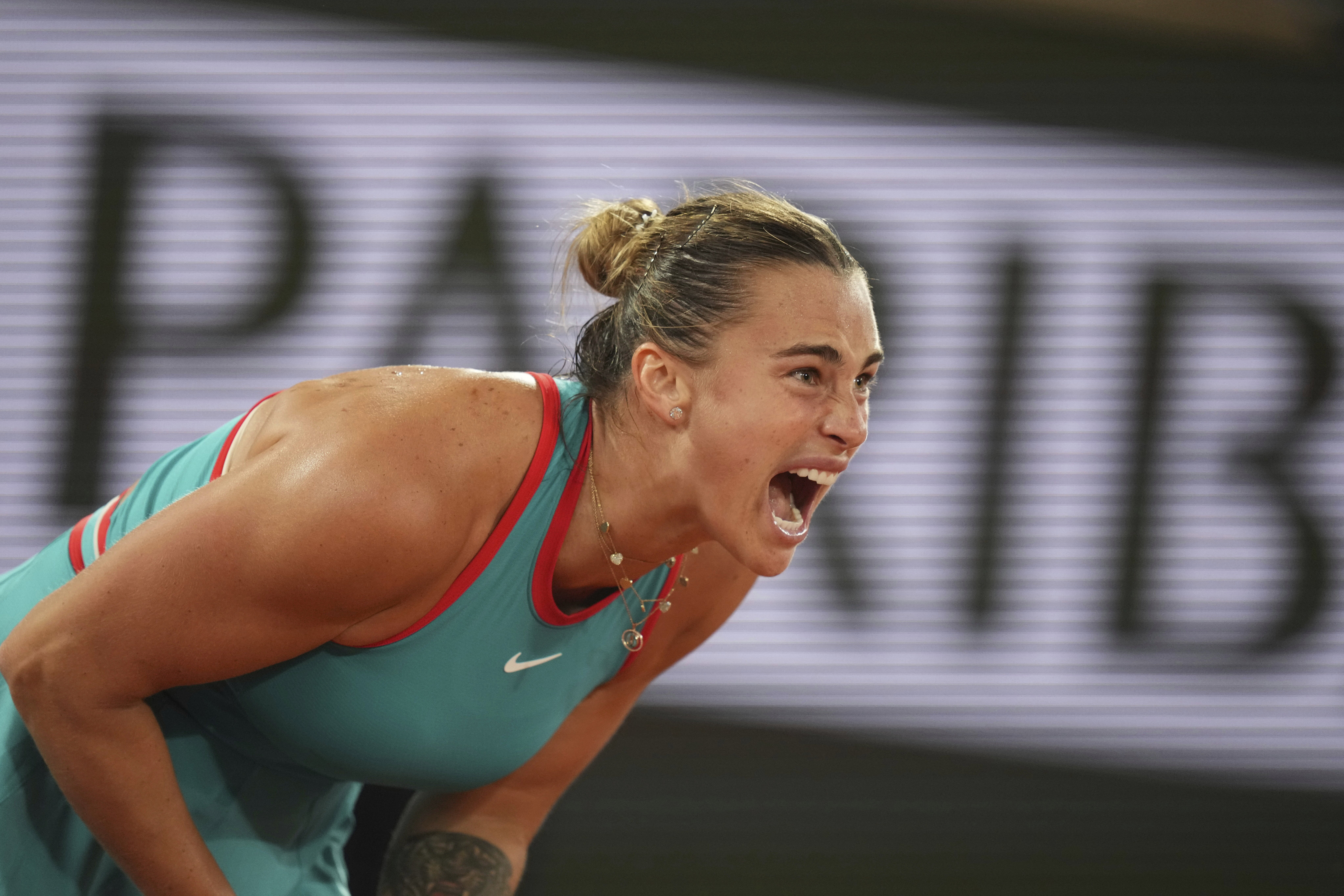 Aryna Sabalenka of Belarus reacts as she plays against Poland's Iga Swiatek during their semifinal match of the French Tennis Open at the Roland-Garros stadium in Paris, Thursday, June 5, 2025.