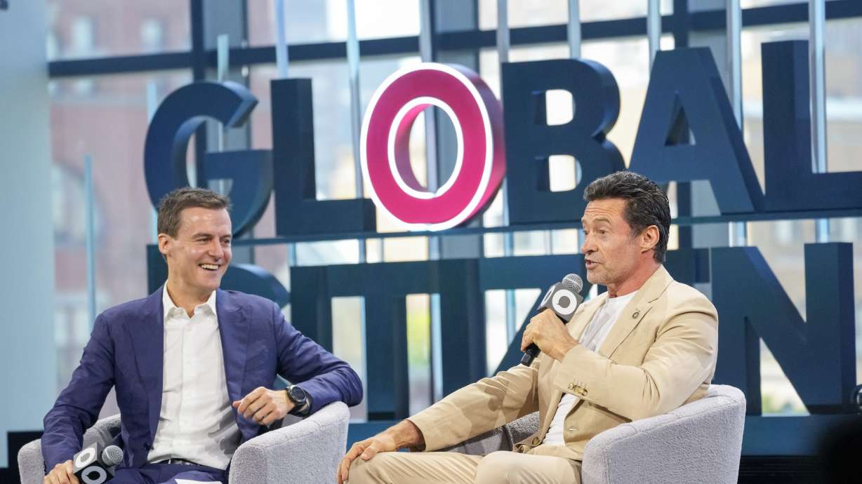 FILE - Actor and Global Citizen Ambassador Hugh Jackman, right, is joined by Global Citizen CEO and Co-Founder Hugh Evans as he addresses attendees of the Global Citizen Now conference, May 2, 2024, in New York.