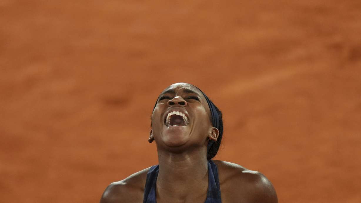 Coco Gauff of the U.S. celebrates as she won the semifinal match of the French Tennis Open against France's Lois Boisson at the Roland-Garros stadium in Paris, Thursday, June 5, 2025.