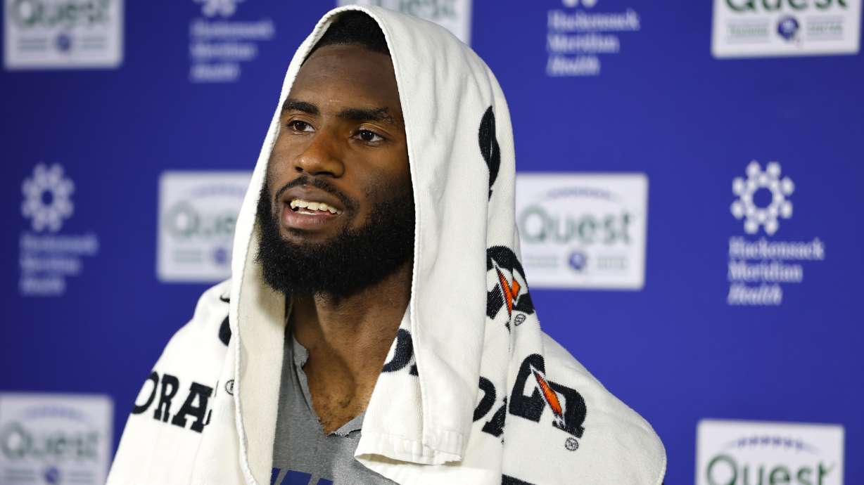 New York Giants linebacker Brian Burns talks to reporters after NFL football practice in East Rutherford, N.J., Thursday, June 5, 2025.