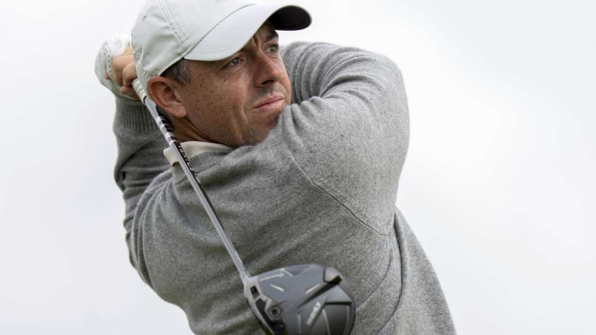 Rory McIlroy, of Northern Ireland, watches his drive on the 18th hole during the first round of the Canadian Open golf tournament in Caledon, Ontario, Thursday, June 5, 2025.
