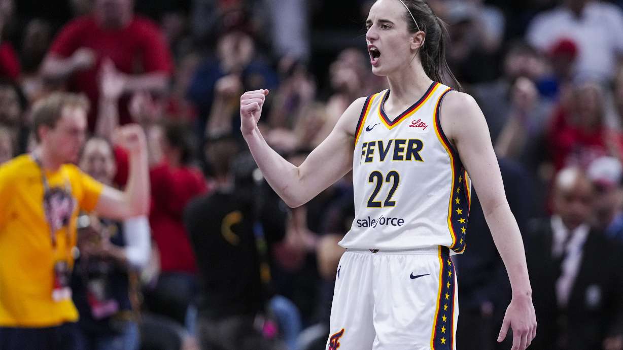 Indiana Fever guard Caitlin Clark (22) reacts after a basket against the New York Liberty in the second half of a WNBA basketball game in Indianapolis, Saturday, May 24, 2025.