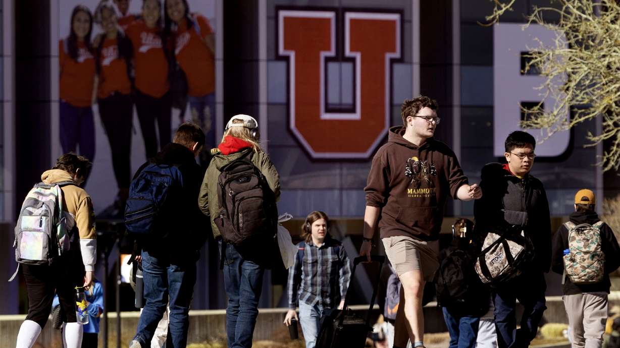 Students walk on the University of Utah campus in Salt Lake City on Feb. 27. The U. on Tuesday announced it has terminated Sigma Nu's fraternity chapter recognition, ending the fraternity's affiliation with the university for "at least" six years.