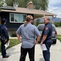 Sandy firefighters help homeowners to reduce wildland fire risk