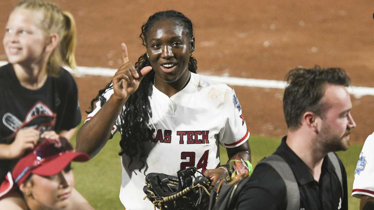 Texas Tech pitcher NiJaree Canady celebrates during the second game of the NCAA softball Women's College World Series finals against Texas in Oklahoma City, Thursday, June 5, 2025. (AP Photo/Kyle Phillips