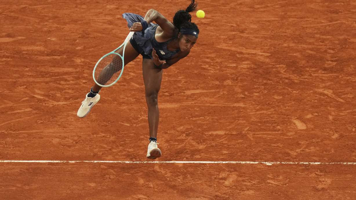 Coco Gauff of the U.S. serves against France's Lois Boisson during their semifinal match of the French Tennis Open at the Roland-Garros stadium in Paris, Thursday, June 5, 2025.