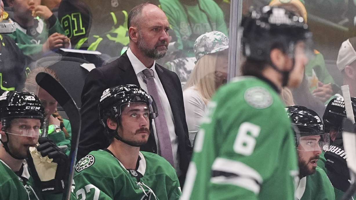 Dallas Stars head coach Pete DeBoer, center, watches play against the Winnipeg Jets in the second period of Game 3 of a second-round NHL hockey playoff series in Dallas, Sunday, May 11, 2025.