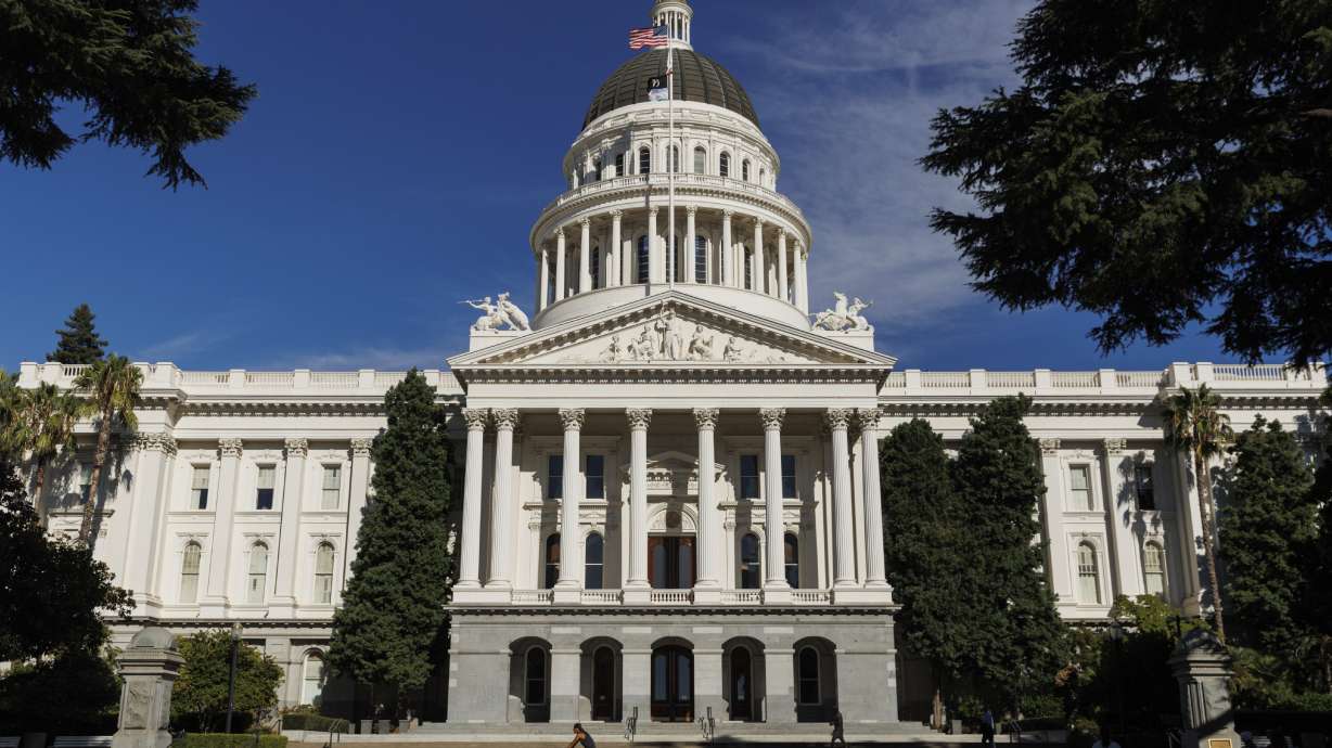 People walk around the California State Capitol, Aug. 5, 2024, in Sacramento, Calif. The state Assembly on Tuesday passed the "Stop Nick Shirley Act," AB2624, protecting those at risk of domestic violence, stalking or other forms of abuse.