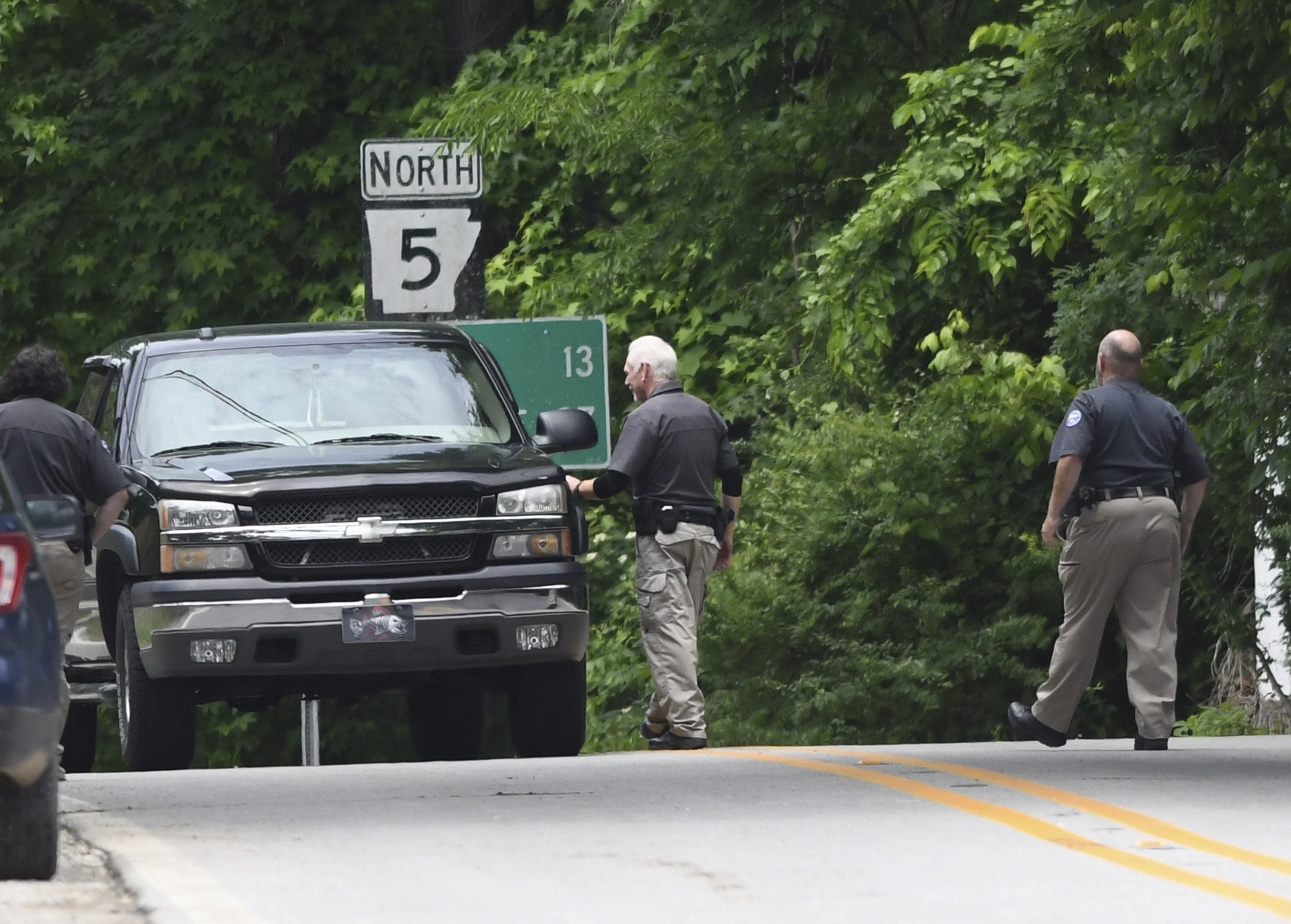 Police set up checkpoints looking for escaped prisoner Grant Hardin, May 29, 2025, near downtown Calico Rock, Ark.