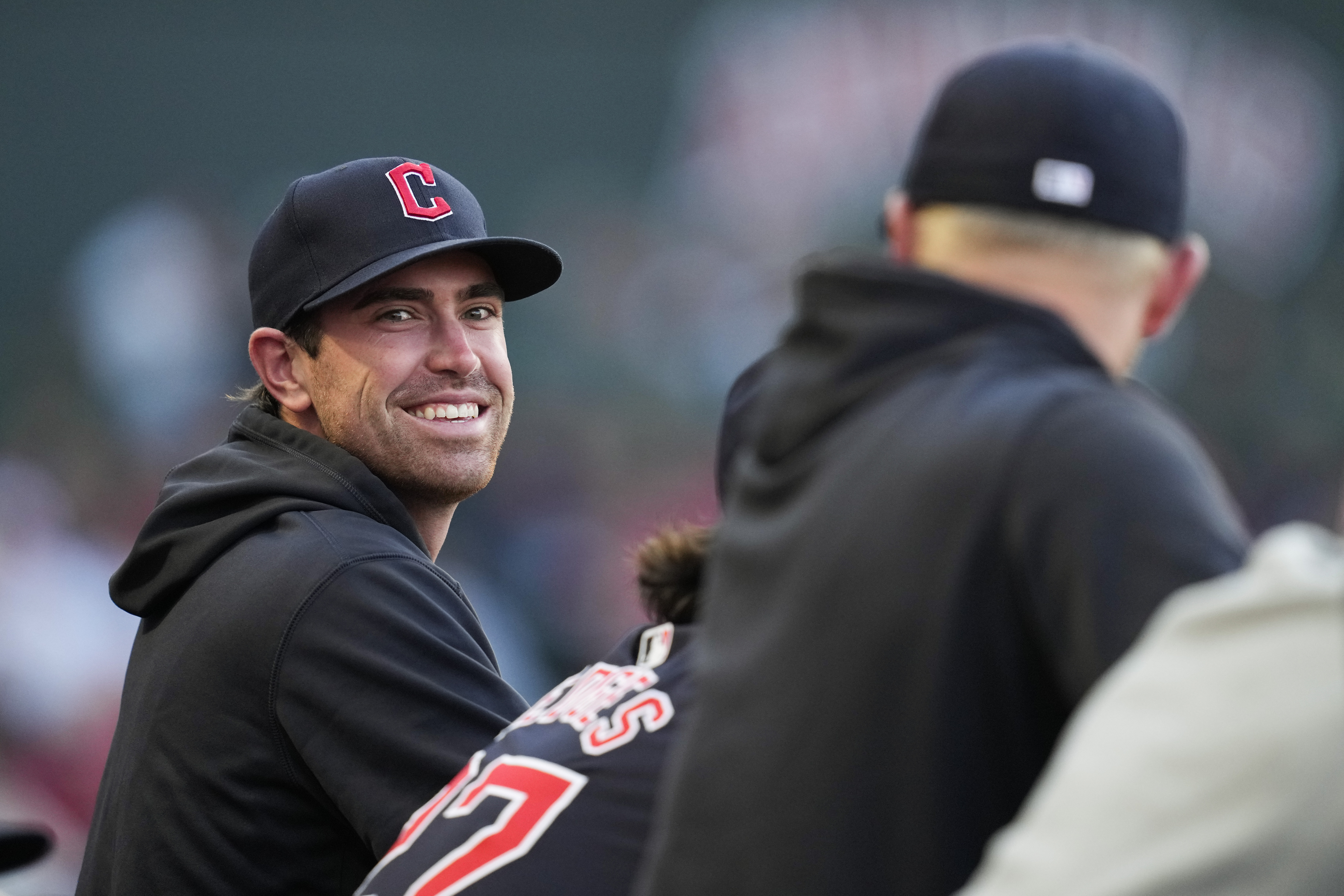 FILE - Cleveland Guardians' Shane Bieber stands in the dugout during the third inning of a baseball game against the Los Angeles Angels in Anaheim, Calif., May 25, 2024. 