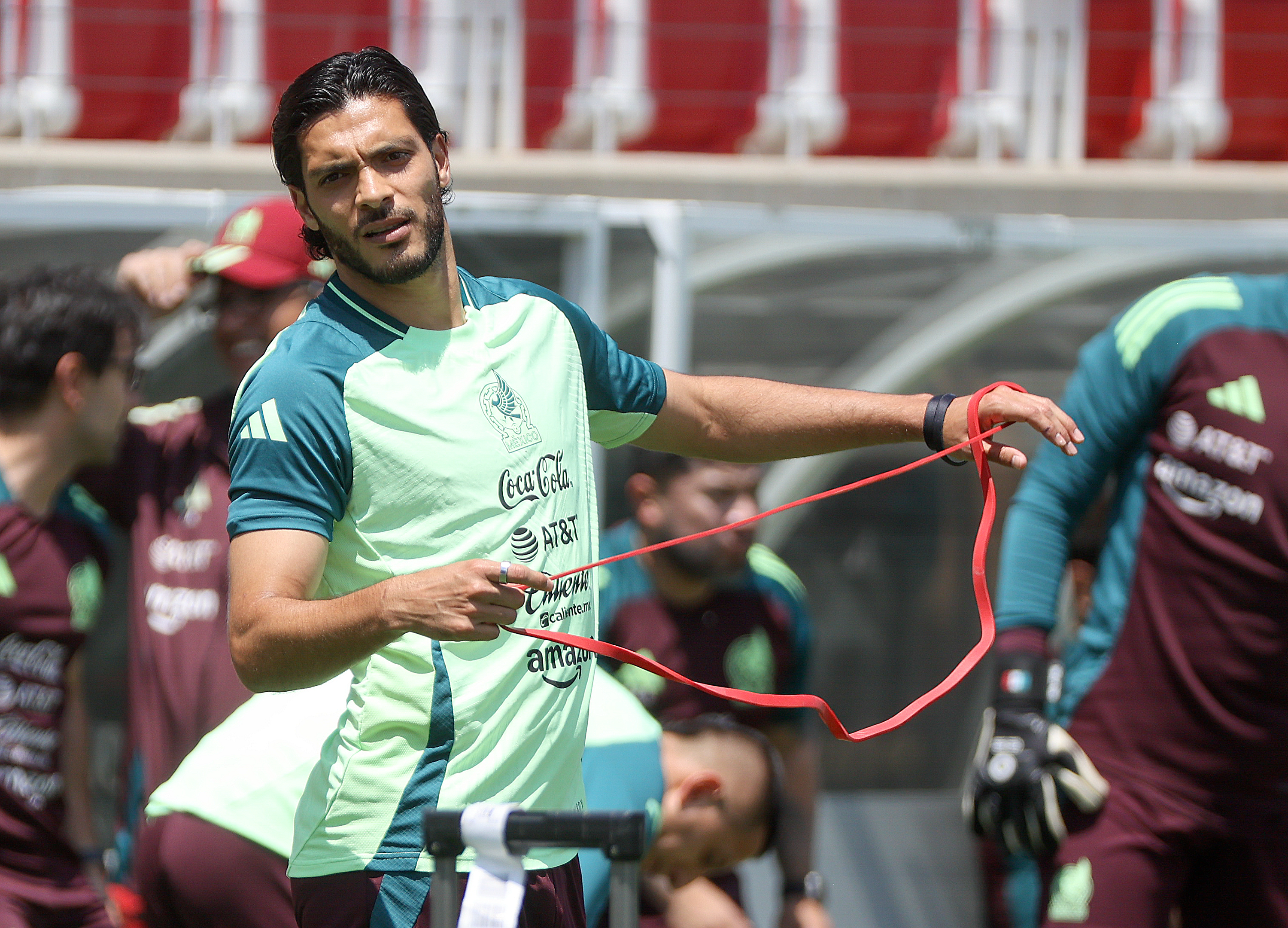 Raul Jimenez warms up with the Mexico national soccer team during practice one day before a game against Switzerland at Rice-Eccles Stadium in Salt Lake City on Friday.
