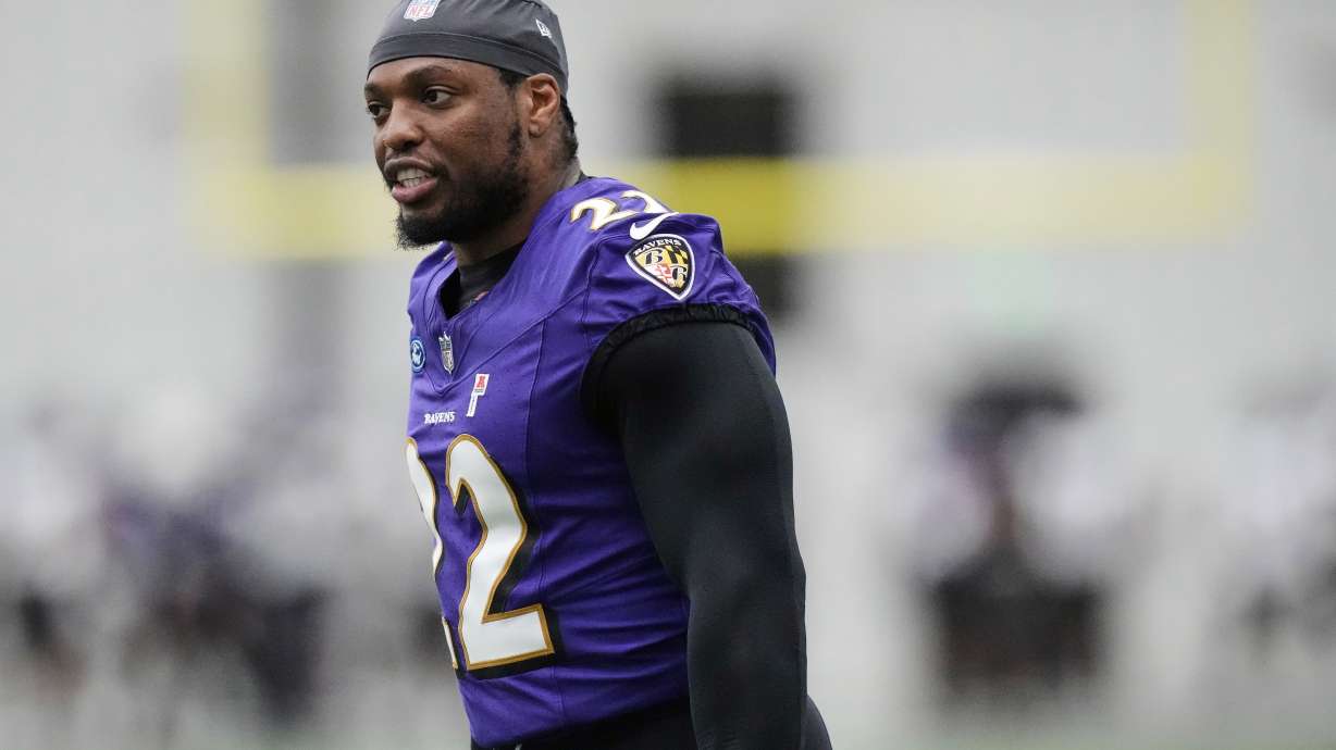 FILE - Baltimore Ravens running back Derrick Henry (22) works out during an NFL football practice, May 28, 2025, at the Under Armour Performance Center in Owings Mills, Md.