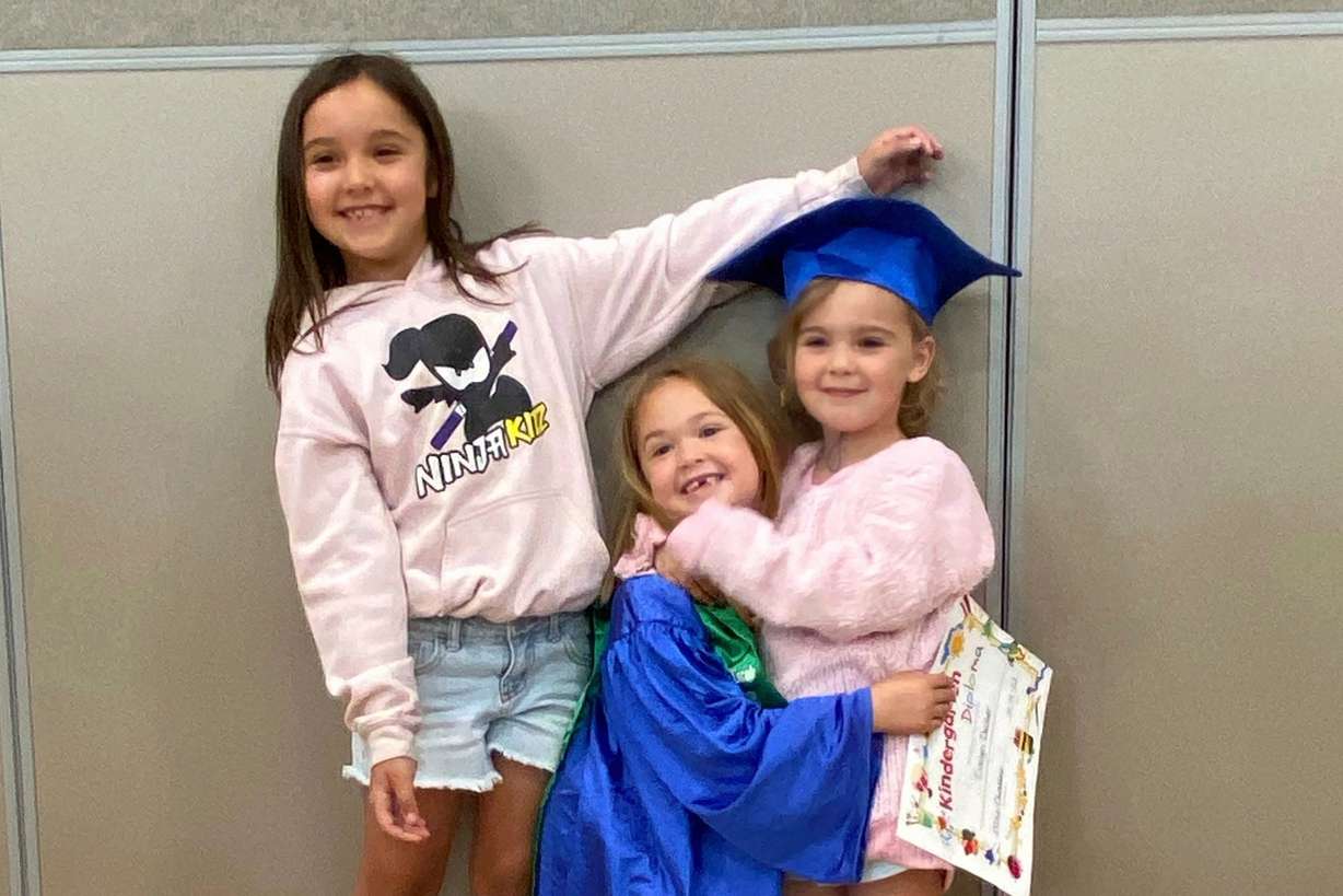 This undated photo provided by Whitney Decker shows Paityn, Olivia and Evelyn Decker.