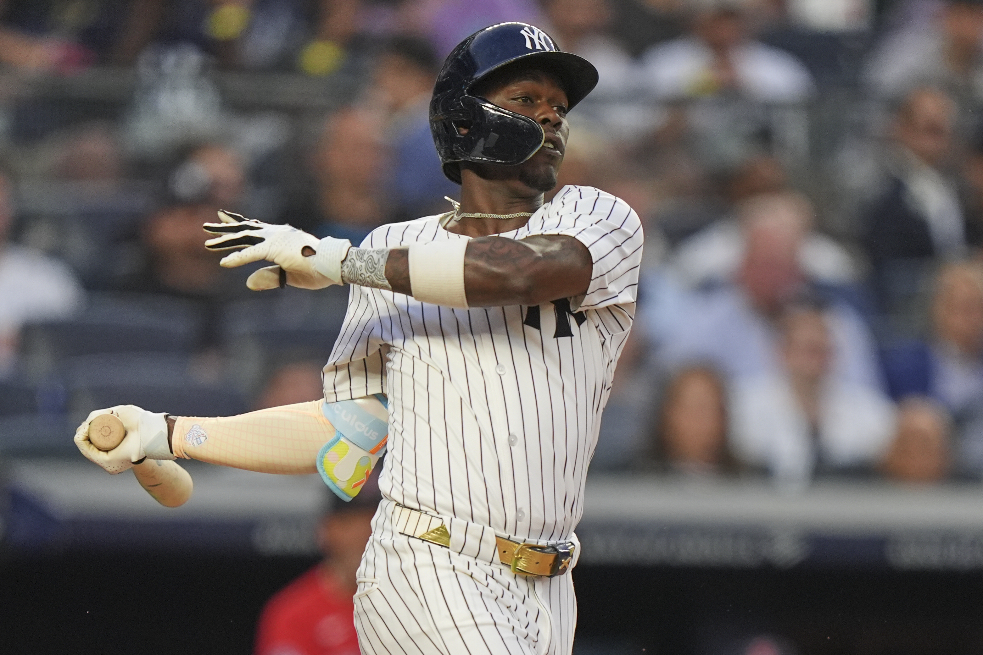 New York Yankees' Jazz Chisholm Jr. hits an RBI single during the second inning of a baseball game against the Boston Red Sox, Friday, June 6, 2025, in New York. 