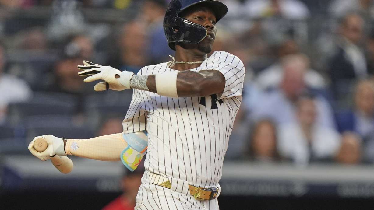 New York Yankees' Jazz Chisholm Jr. hits an RBI single during the second inning of a baseball game against the Boston Red Sox, Friday, June 6, 2025, in New York.