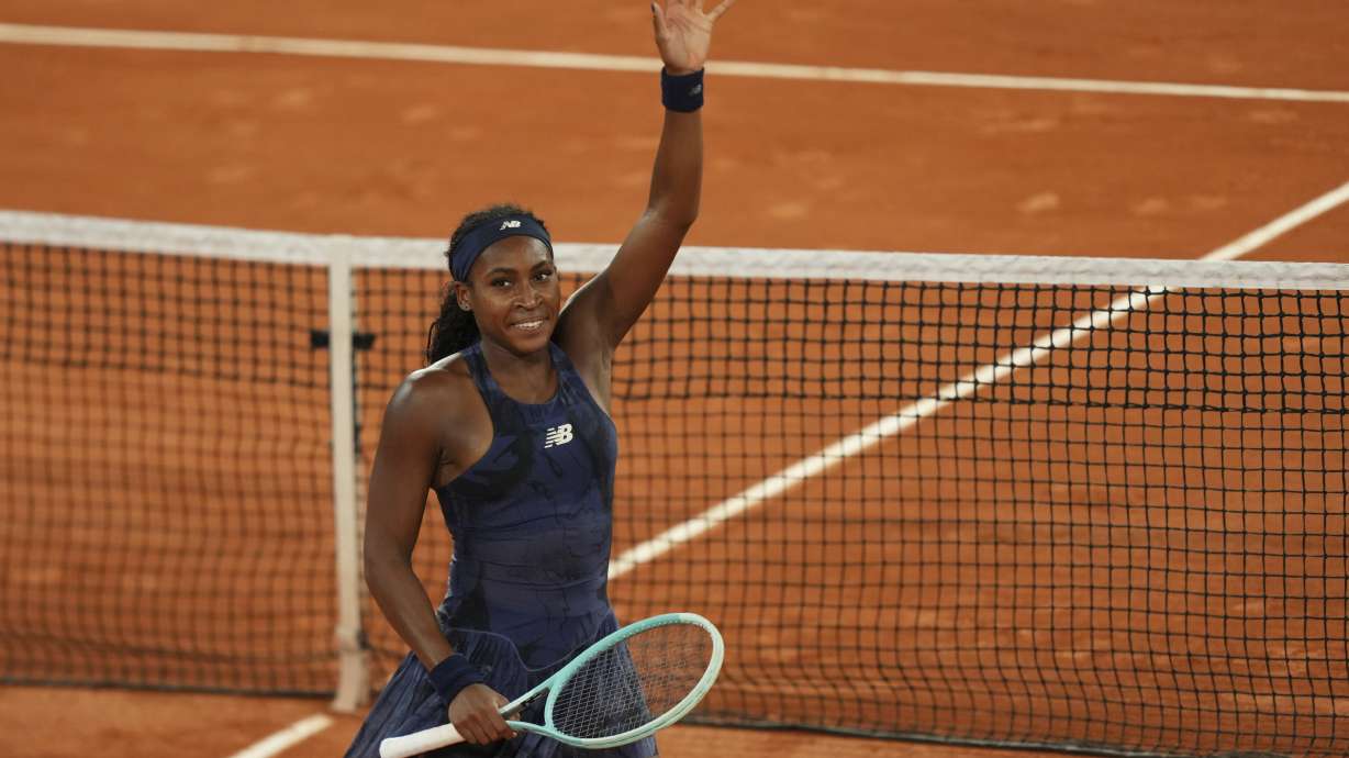 Coco Gauff of the U.S. celebrates as she won the semifinal match of the French Tennis Open against France's Lois Boisson at the Roland-Garros stadium in Paris, Thursday, June 5, 2025.