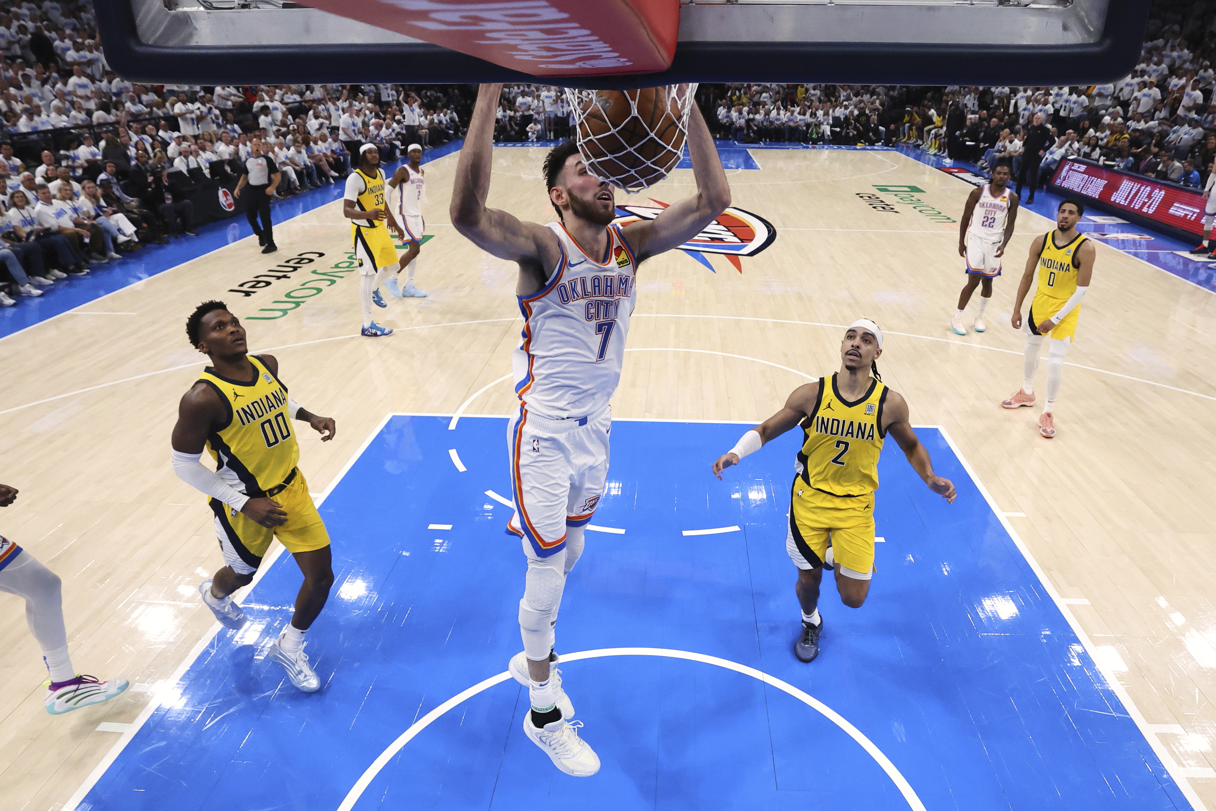 Oklahoma City Thunder forward Chet Holmgren (7) dunks during the second half in Game 1 of the NBA Finals basketball series against the Indiana Pacers Thursday, June 5, 2025, in Oklahoma City.