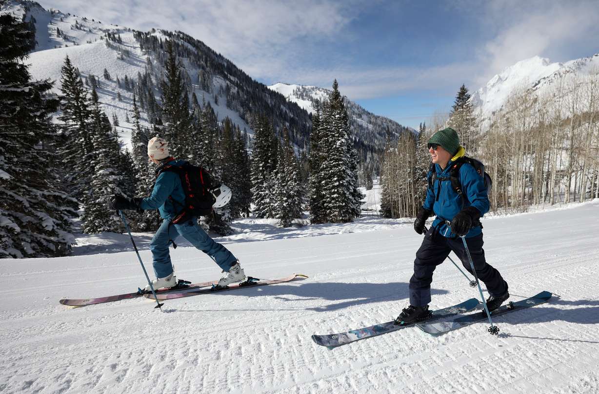 Ashley Marten and Alastair Moody ski up Little Cottonwood Canyon on Feb. 12.
