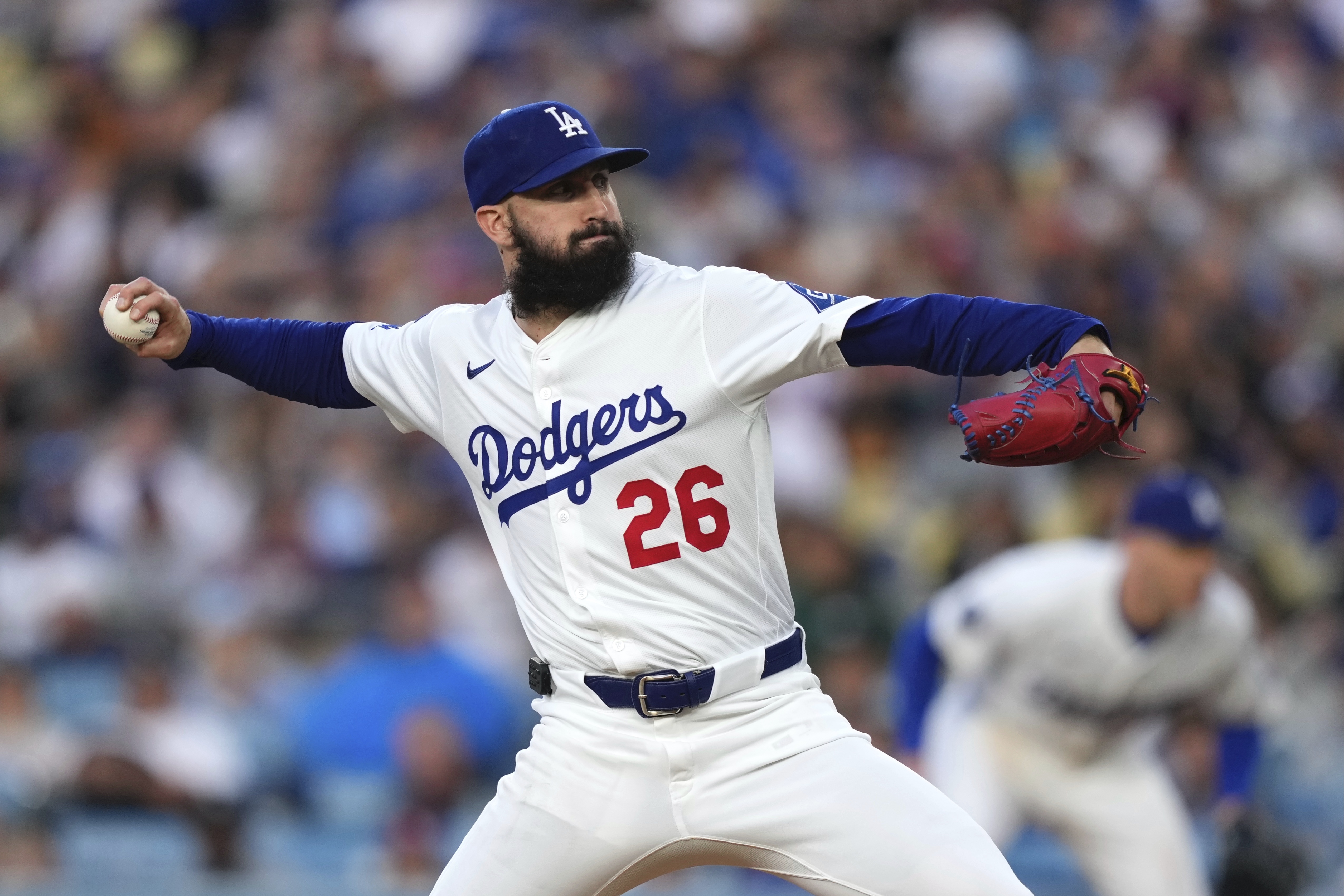 Los Angeles Dodgers starting pitcher Tony Gonsolin throws to the plate during the second inning of a baseball game against the New York Mets, Wednesday, June 4, 2025, in Los Angeles.