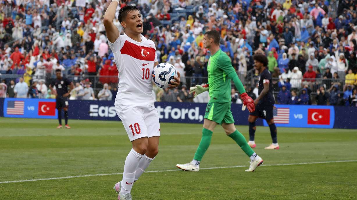 Turkey forward Arda Güler (10) reacts after scoring a goal past United States goalie Matt Freese (25) during the first half of an international friendly soccer game, Saturday, June 7, 2025, in East Hartford, Conn.
