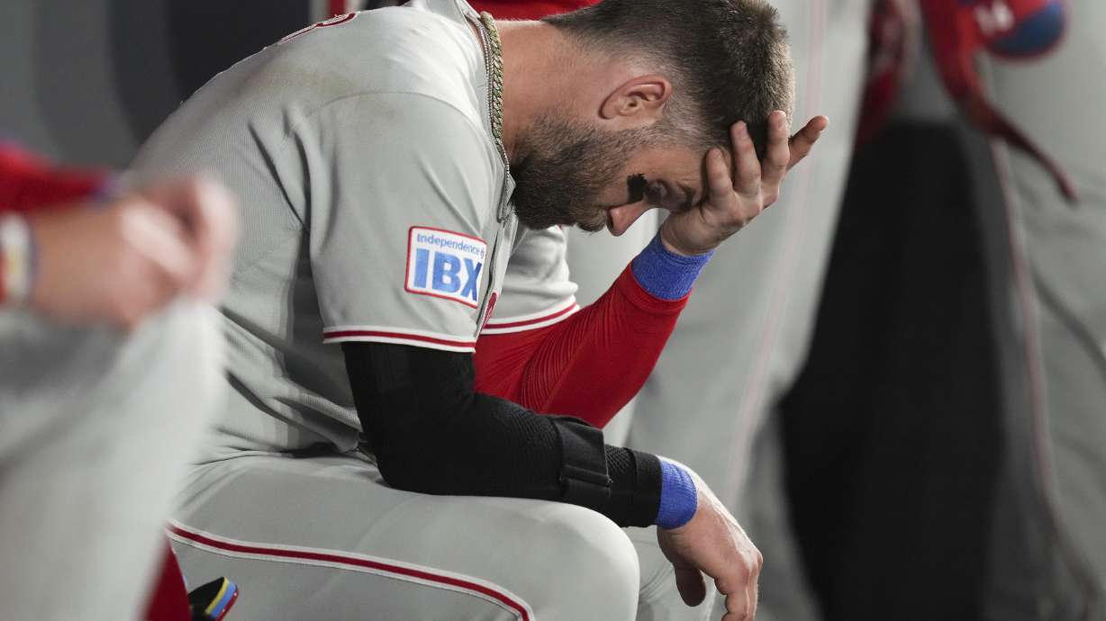 Philadelphia Phillies' Bryce Harper (3) sits in the dug out after losing to the Toronto Blue Jays in a baseball game in Toronto, Thursday, June 5, 2025.