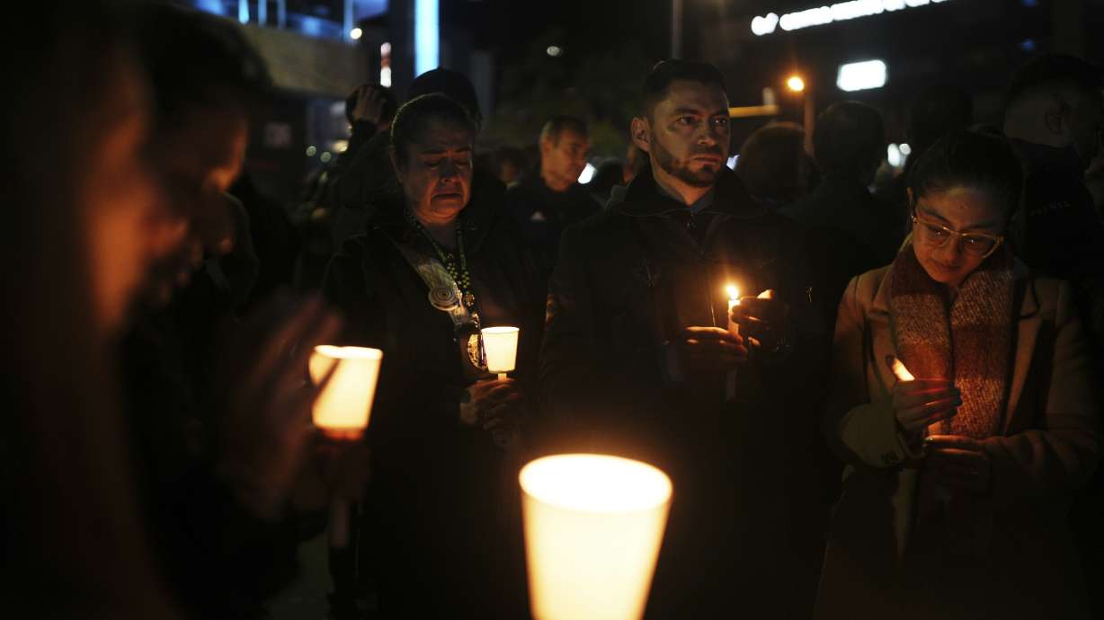 A vigil outside the Santa Fe hospital where Colombian senator and presidential candidate Miguel Uribe Turbay is being treated after he was shot during a campaign rally in Bogota, Colombia, Saturday. Turbay's wife said he is fighting for his life.