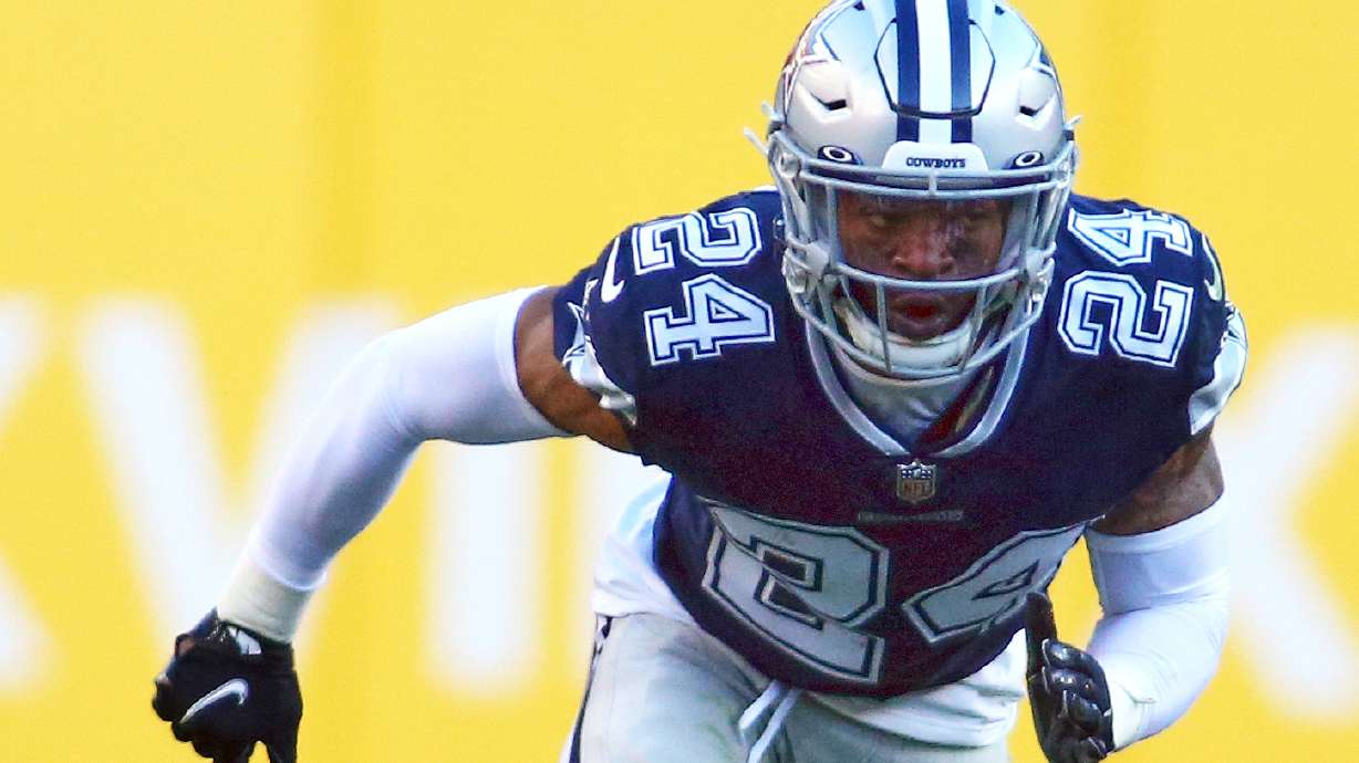 FILE - Dallas Cowboys cornerback Kelvin Joseph (24) runs during an NFL football game against the Washington Football Team, Dec. 12, 2021 in Landover.