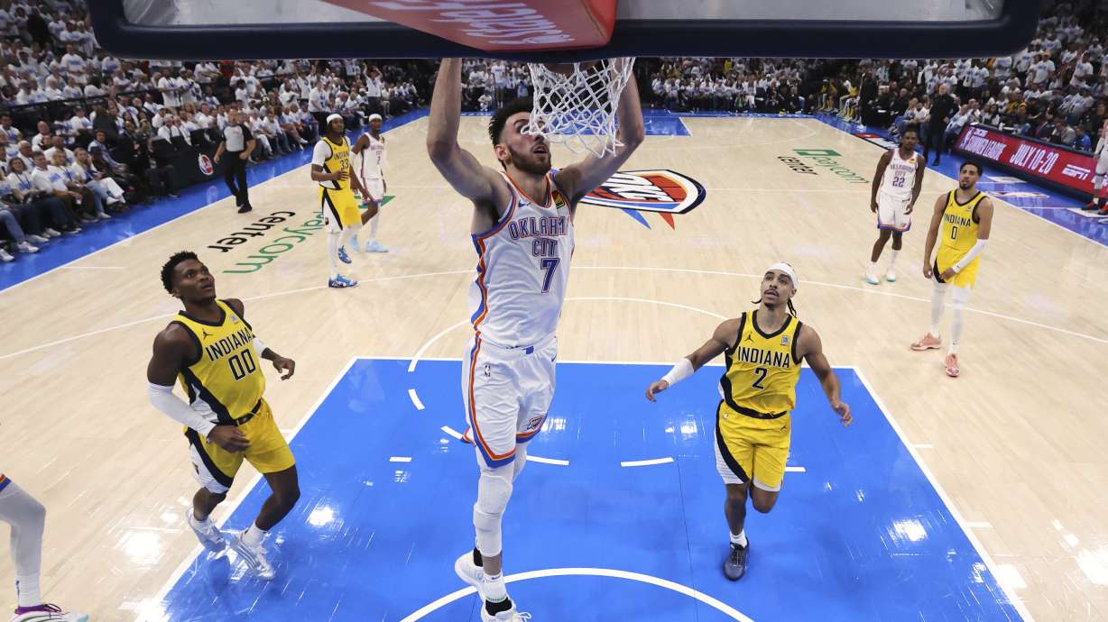 Oklahoma City Thunder forward Chet Holmgren (7) dunks during the second half in Game 1 of the NBA Finals basketball series against the Indiana Pacers Thursday, June 5, 2025, in Oklahoma City.