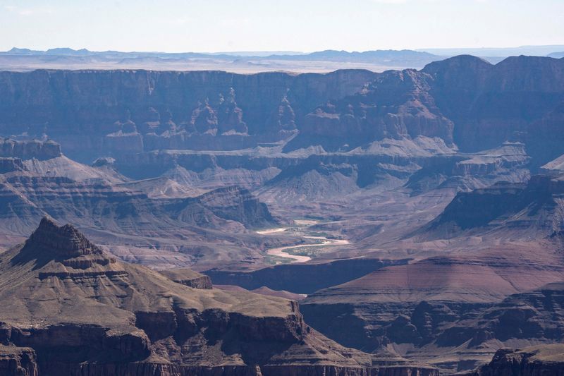 The Colorado River snakes through the canyon as seen from the south rim of Grand Canyon National Park near Tusayan, Ariz., May 16.