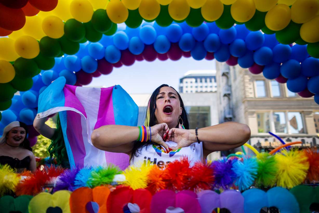 The iHeartRadio float drives down 100 South in the annual Utah Pride Parade in Salt Lake City on Sunday.