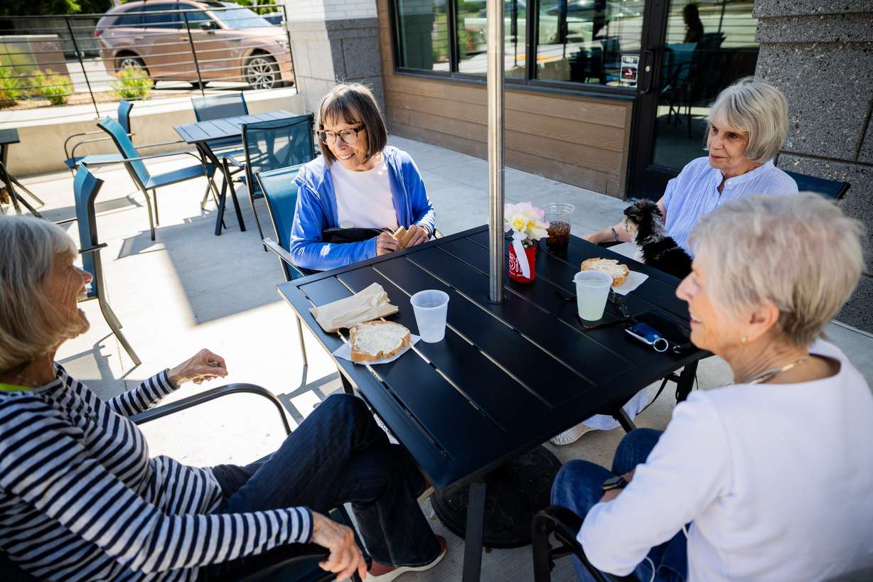 Bonnie Shepherd, front right, meets with friends Kim S., left, Jeanne Mackenzie, center, and Diane McMakin, right, for lunch at Great Harvest Bakery Cafe in Salt Lake City, June 6.