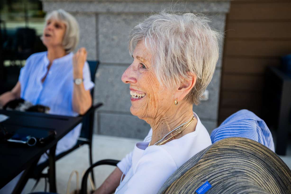 Bonnie Shepherd, center, meets with friends Diane McMakin, left, and Kim S., off camera, for lunch at Great Harvest Bakery Cafe in Salt Lake City on June 6.