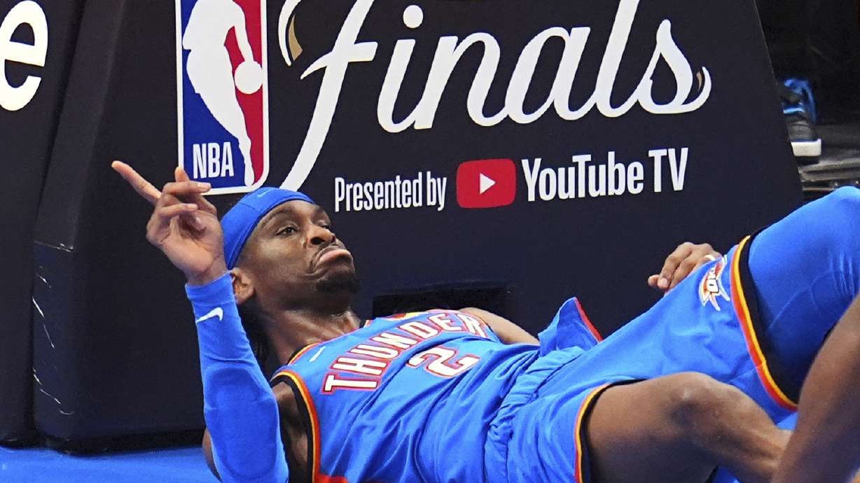 Oklahoma City Thunder guard Shai Gilgeous-Alexander (2) questions a call during the second half of Game 2 of the NBA Finals basketball series against the Indiana Pacers Sunday, June 8, 2025, in Oklahoma City.