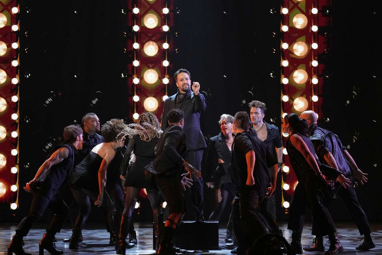 Lin-Manuel Miranda, center, performs a medley from "Hamilton" during the 78th Tony Awards on Sunday at Radio City Music Hall in New York.