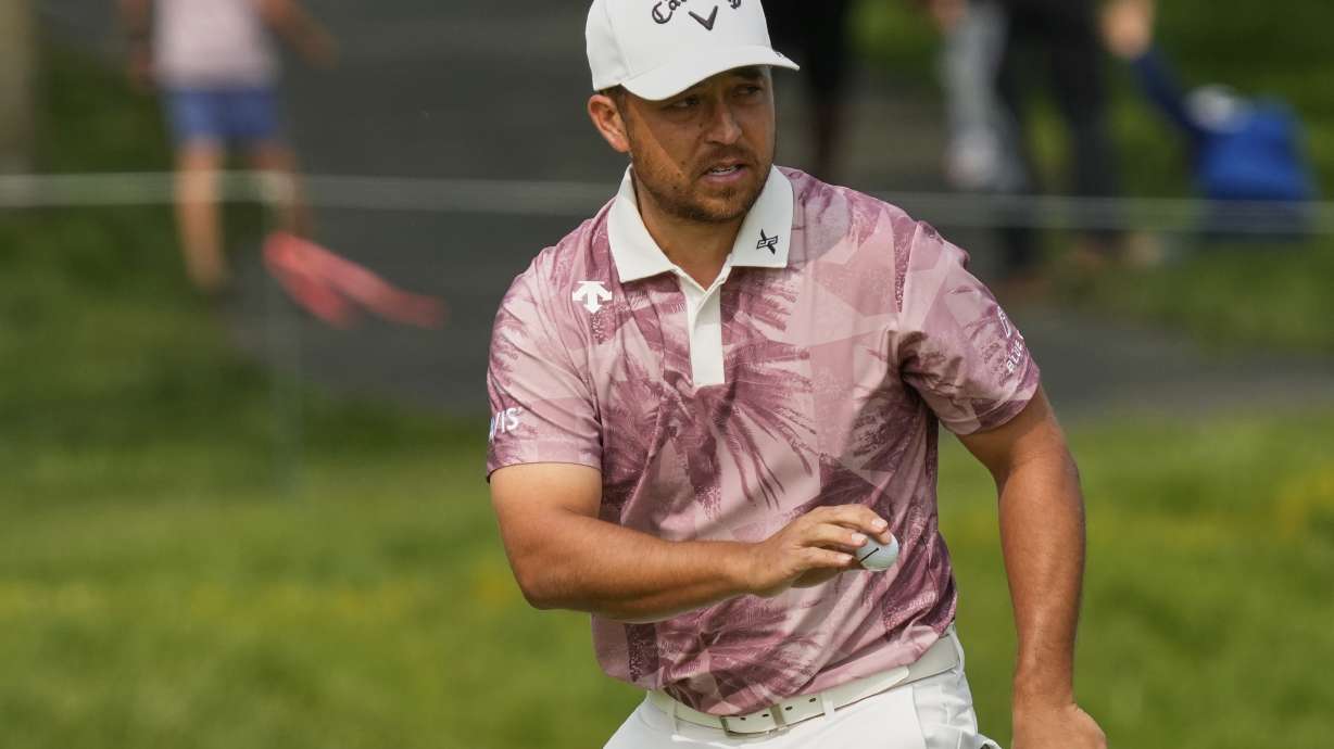 Xander Schauffele gestures after his putt on the ninth green during the third round of the Memorial golf tournament Saturday, May 31, 2025, in Dublin, Ohio.