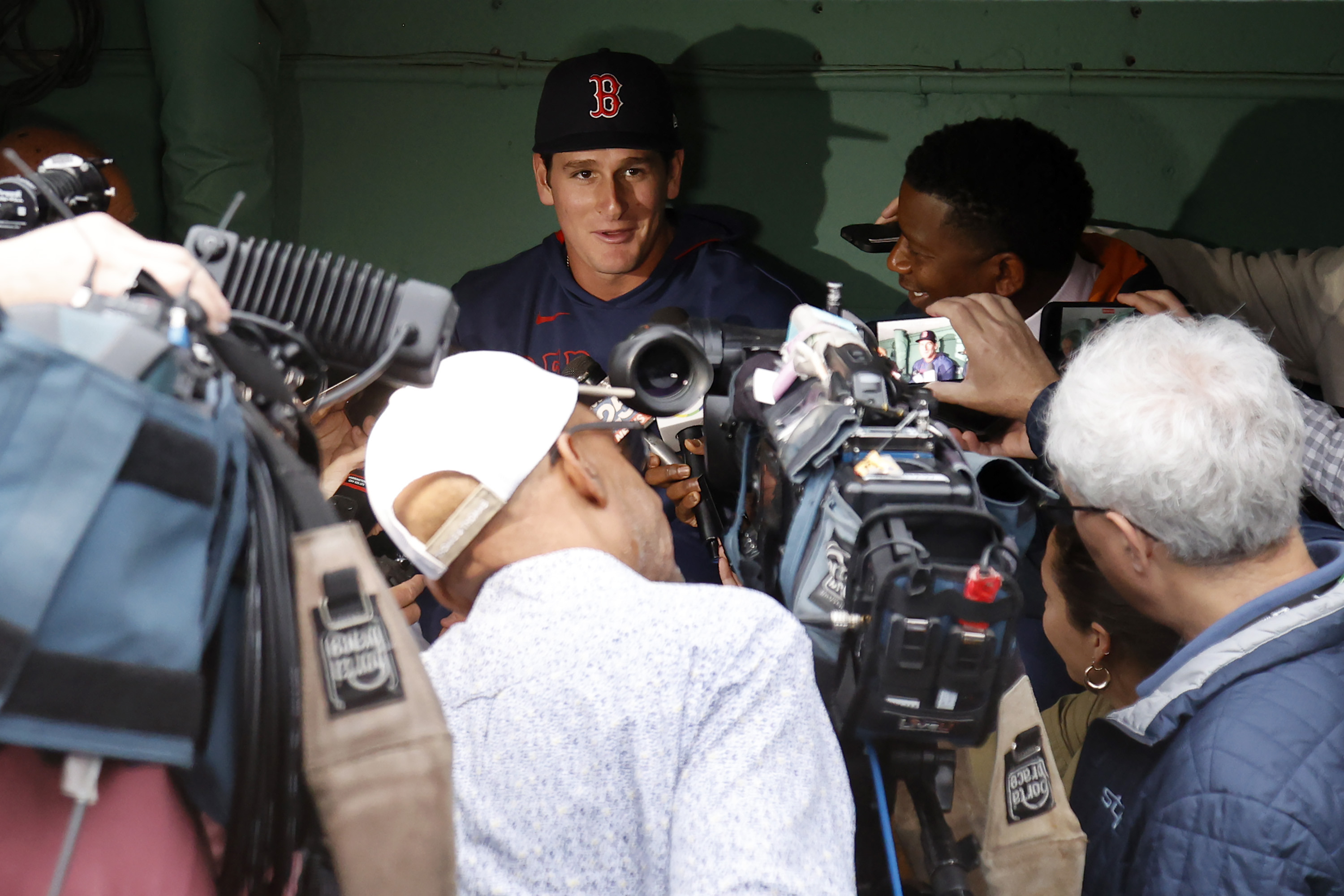 Boston Red Sox outfielder Roman Anthony speaks with the media in the dugout before making his first major league start in a baseball game against the Tampa Bay Rays at Fenway Park, Monday, June 9, 2025, in Boston. 