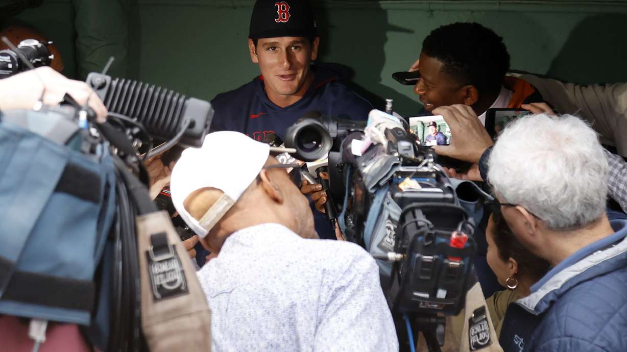Boston Red Sox outfielder Roman Anthony speaks with the media in the dugout before making his first major league start in a baseball game against the Tampa Bay Rays at Fenway Park, Monday, June 9, 2025, in Boston.