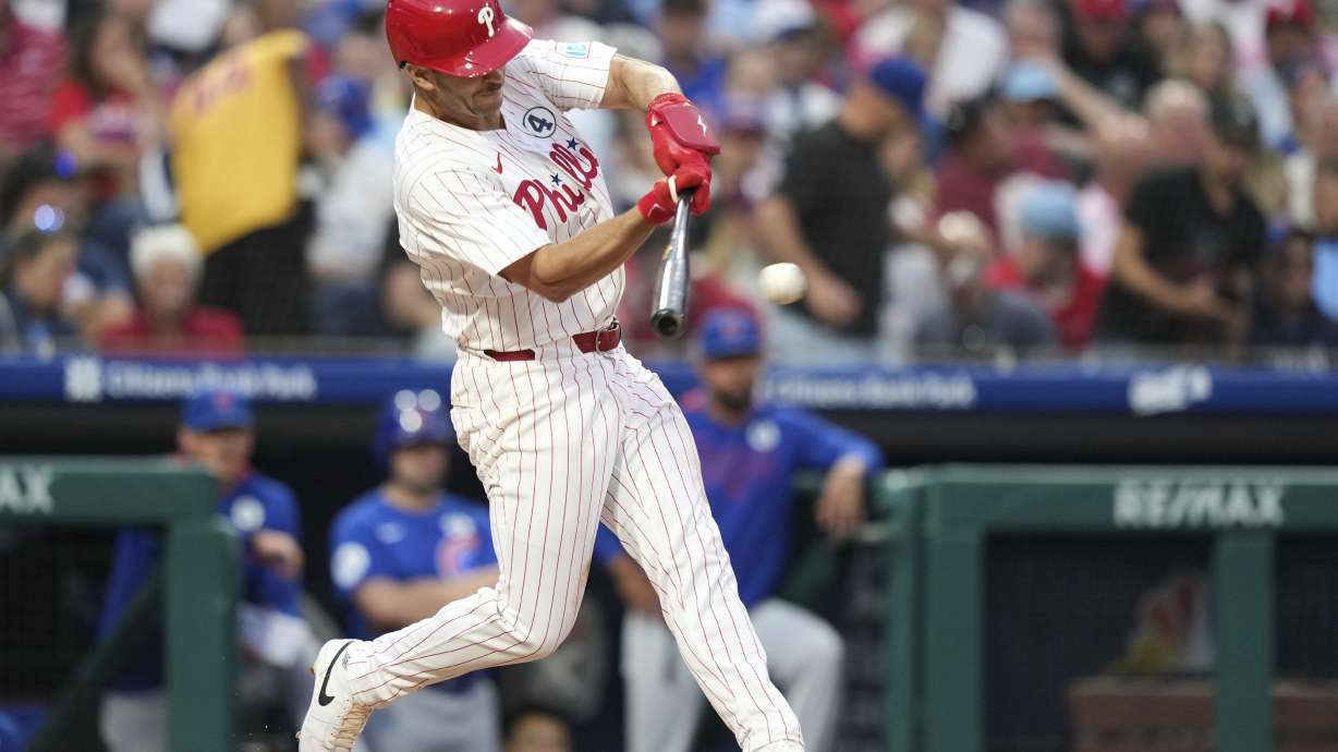 Philadelphia Phillies' Otto Kemp hits a single against Chicago Cubs pitcher Matthew Boyd during the fifth inning of a baseball game Monday, June 9, 2025, in Philadelphia.