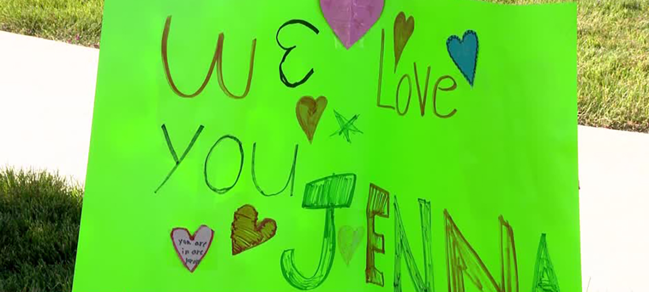 A poster of support is seen in Lehi on Monday, in honor of 14-year-old Jenna Sharp, who died Saturday in the hospital after being hit by a car on May 30.