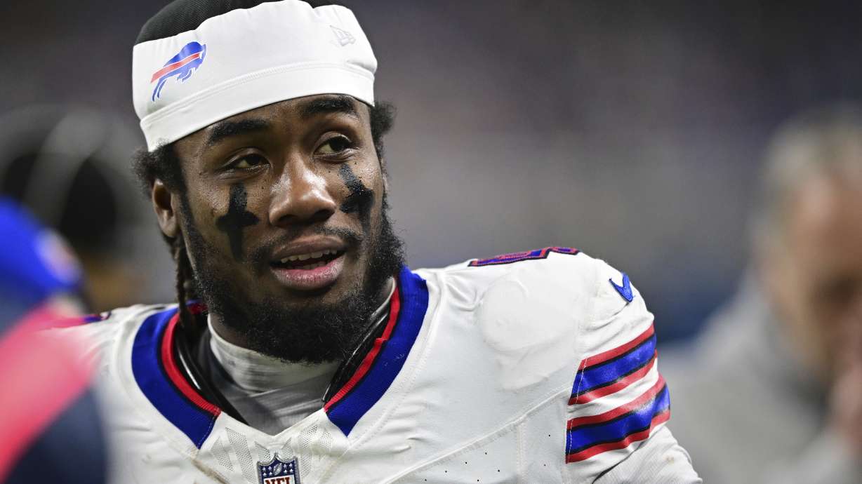 FILE - Buffalo Bills running back James Cook talks on the sideline during the second half of an NFL football game against the Detroit Lions in Detroit, Sunday, Dec. 15, 2024. The Bills won 48-42.