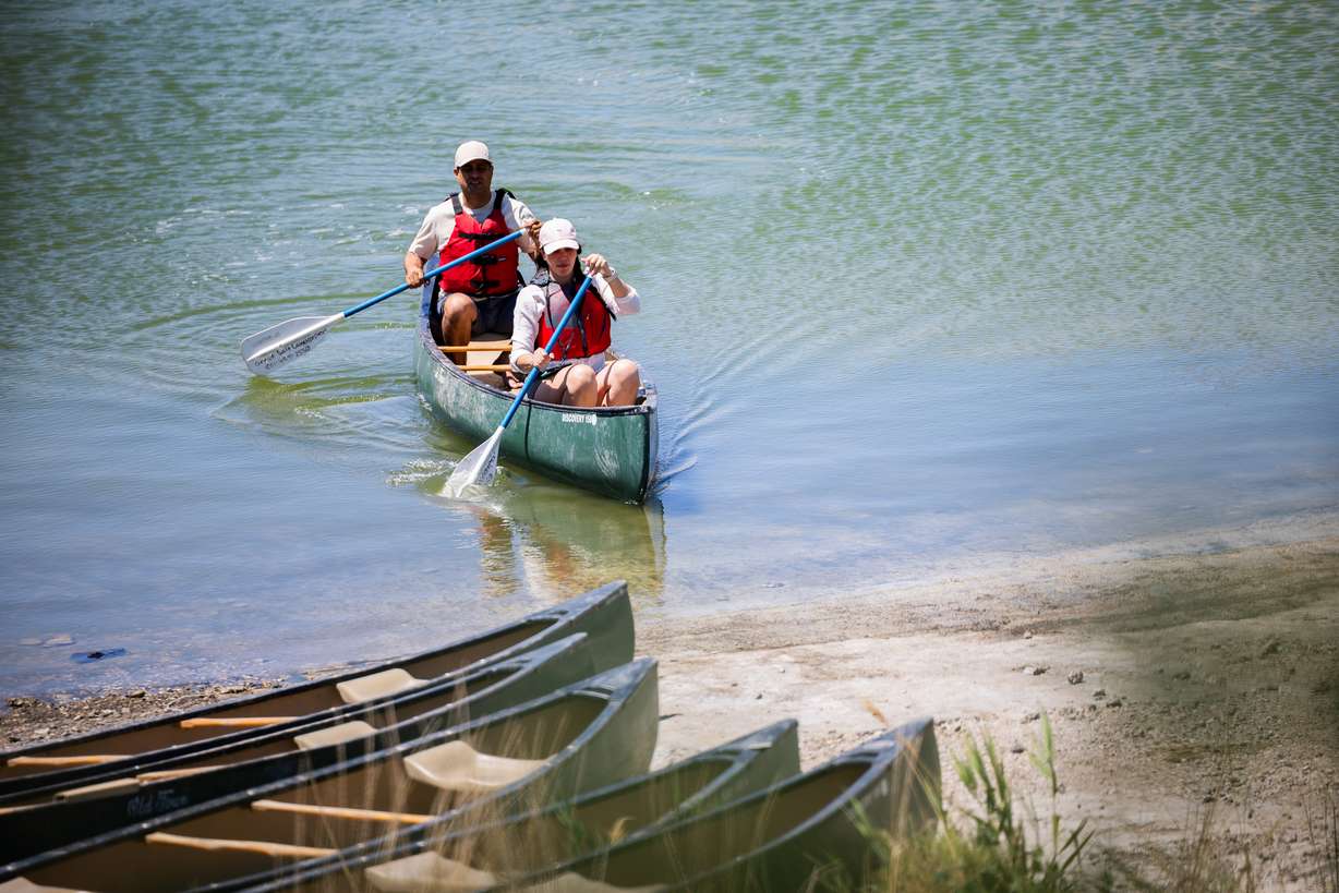 People canoe at Sailfest at the Great Salt Lake State Park and Marina in Magna on Saturday.